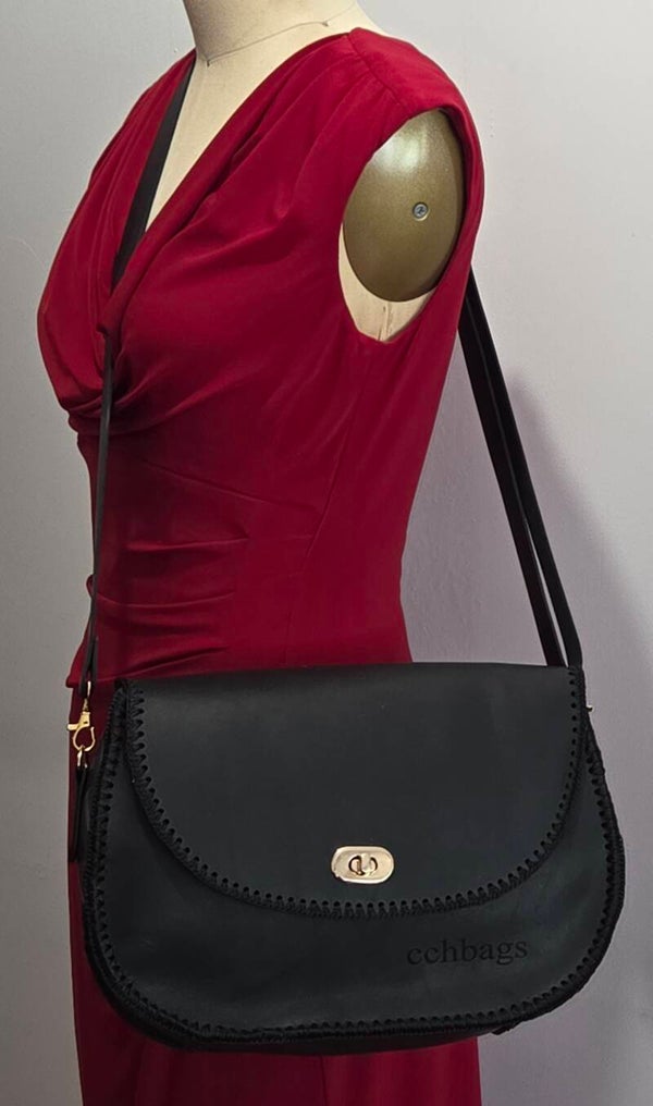 Caricia Black Handbag.