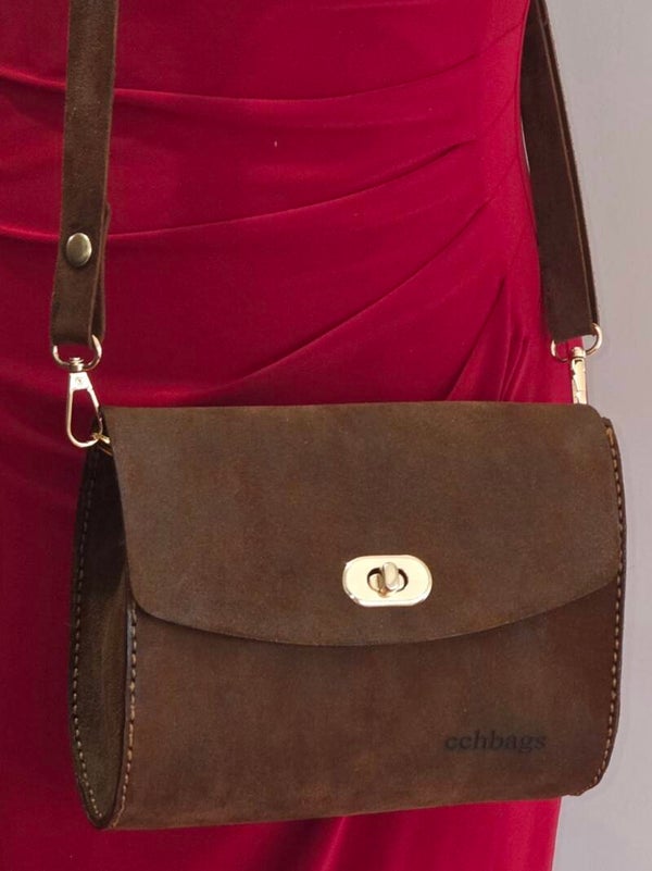 Brown Oval Genuine Leather Crossbody.