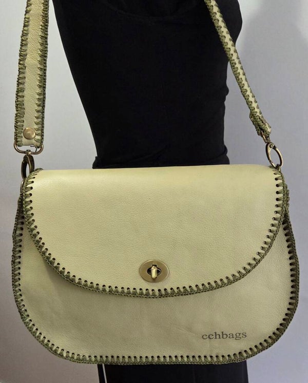 Slim Caricia Genuine Leather Handbag.