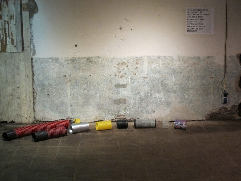 Wall text in Ovisms, with a work by Topp & Dubio