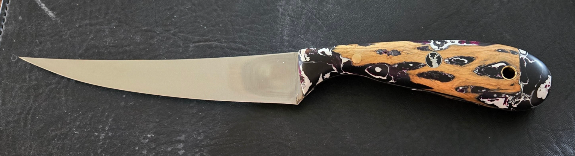 Stainles steel fillet knife , 6 inch blade, 11.5 overall. Cholla wood and resin scales.