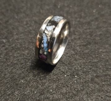 R12 - Size 8 Stainless steel comfort fit inlay ring. Glow stone, UV reactive. Glowing with Ruby flake
