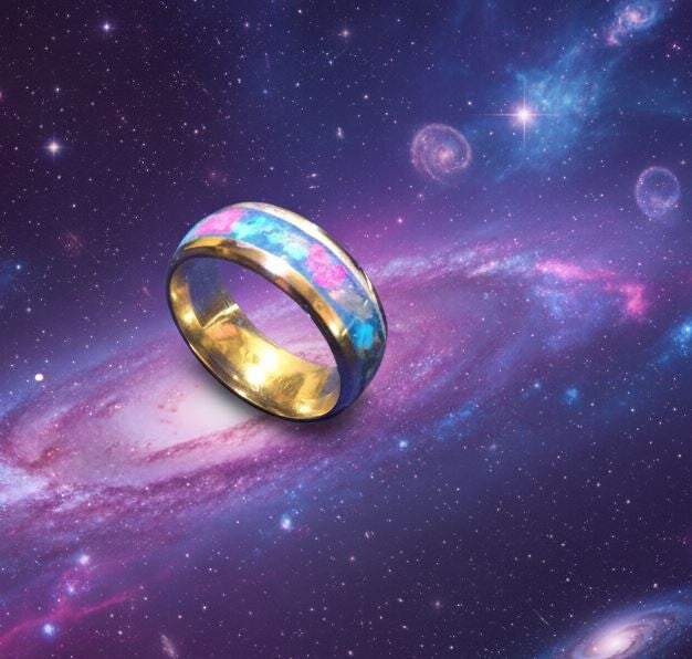 R-3 Galaxy Ring size 9- Stainless steel, glow stone, ruby and opal U.V.