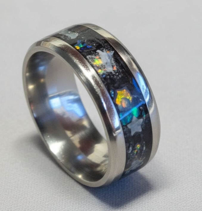 R-4 Size 7 glow ring. Stainless steel. Glowing stars, moon and butterflies . Magical Charm ring