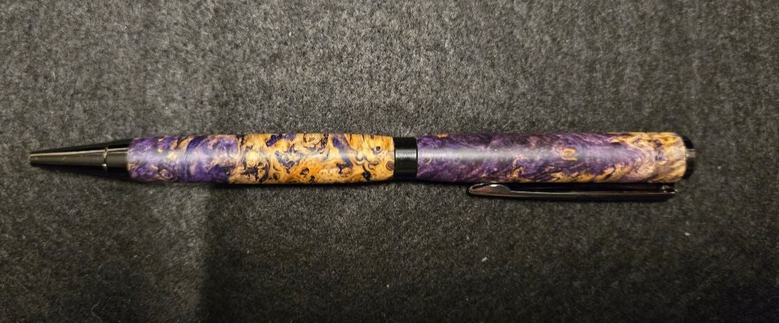 Slim2 - Slimline twist pen. black ink. Purple stabilized burl. it is AMAZING.