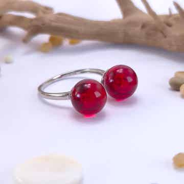 Verstelbare ring met glasbolletjes - transparant rood