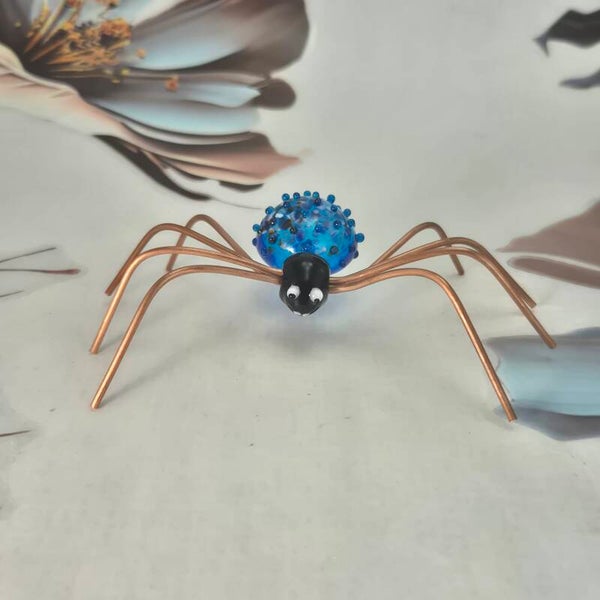 Spinnetje - turquoise blauw glas