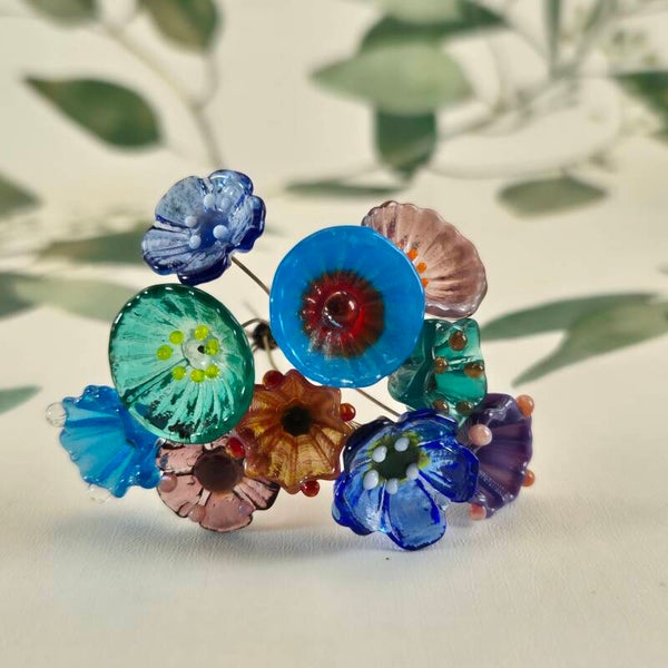 Tien glazen bloemetjes  - blauw/roze/paars/zeegroen