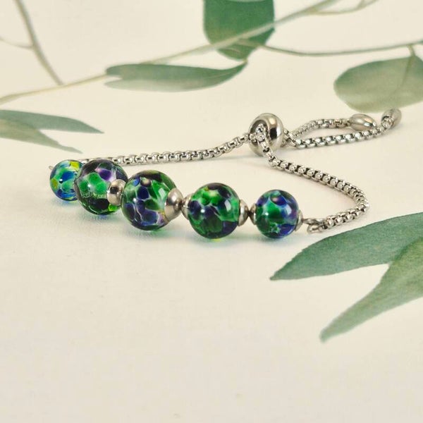 Schuifarmband van edelstaal met 5 glaskralen, transparant groen en blauw - Ocean