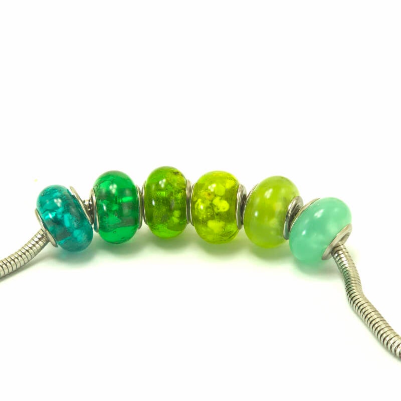 Glaskralen met as erin verwerkt