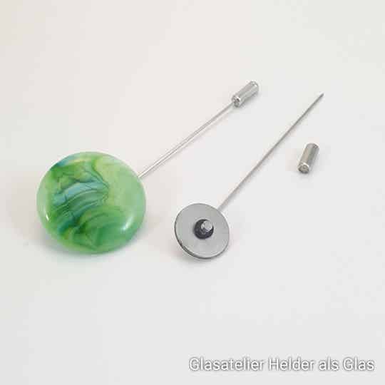 Wissel -sierspeld, -broche, -vestsluiting