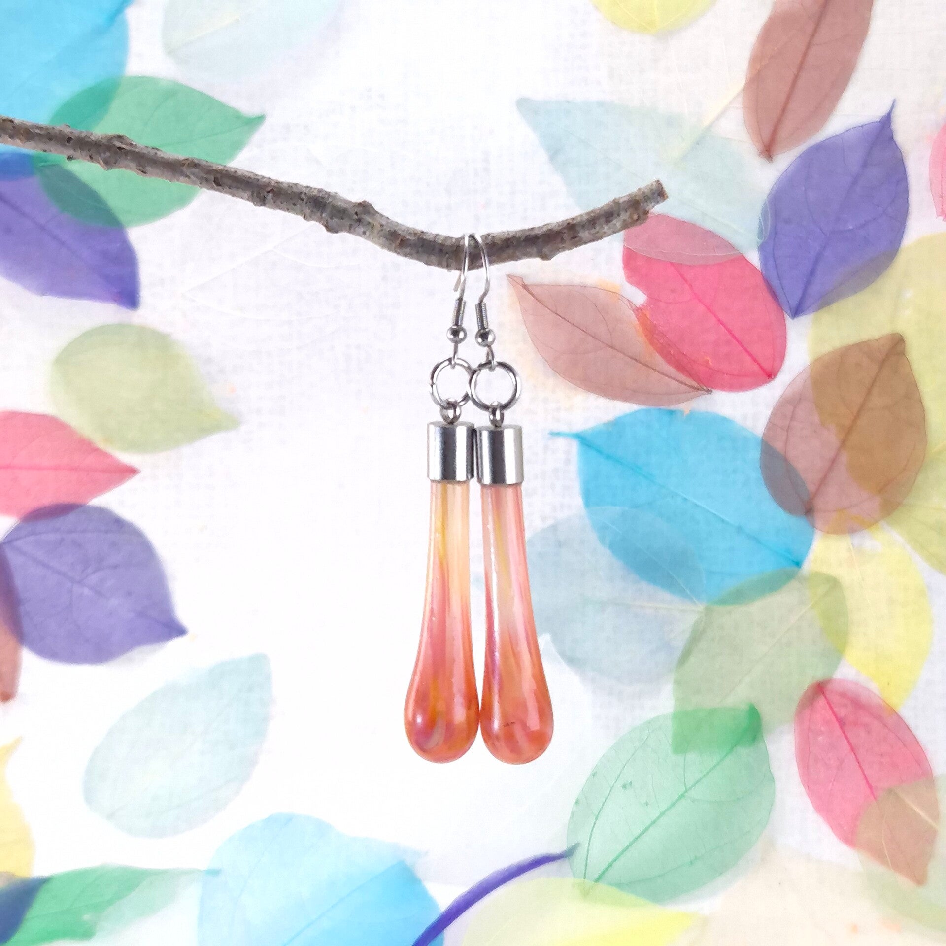 Glazen oorbellen druppelvorm - semi-transparant roze, zalmroze en zachtgeel