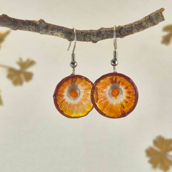 Glazen oorbellen div met bloemetjes van glas rood-wit-oranje