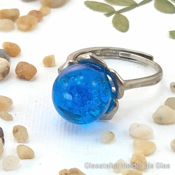 Verstelbare ring met transparante glastop, turquoise-blauw met luchtbelletjes