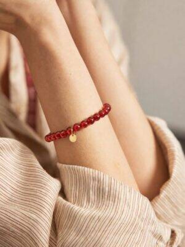 Ellen Beekmans Armbandje met gemstone balletjes ( Burnt orange)