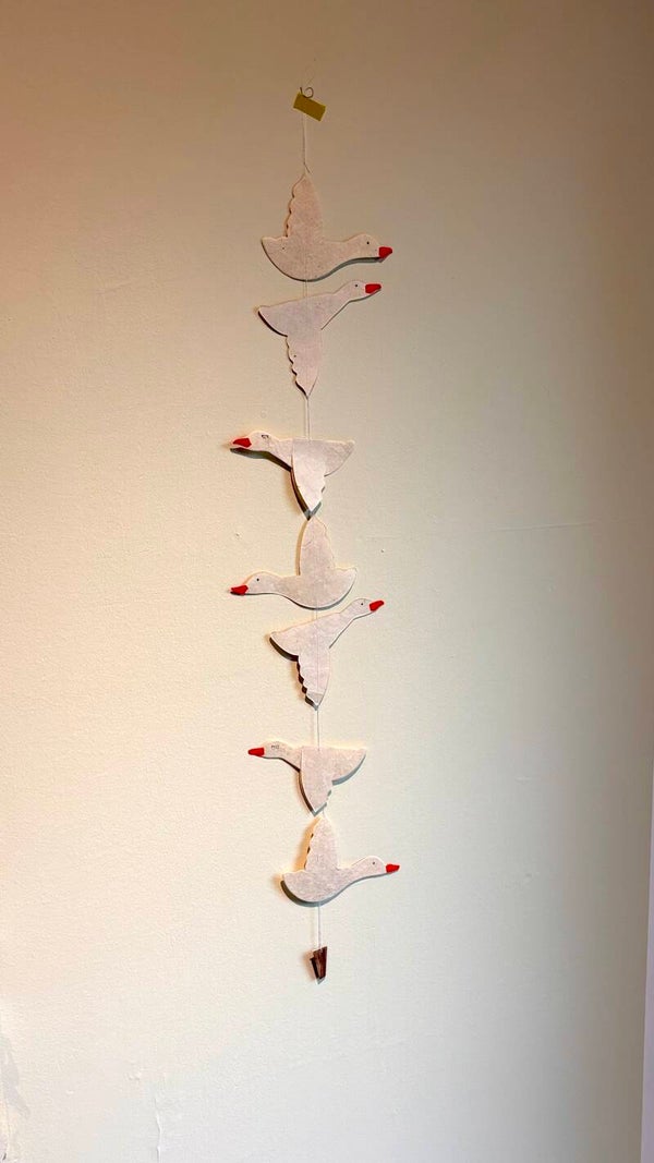 Swan slinger
