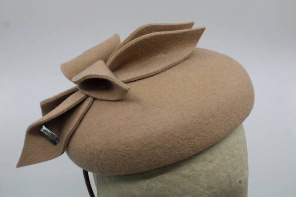 Haarbanddop rond - beige