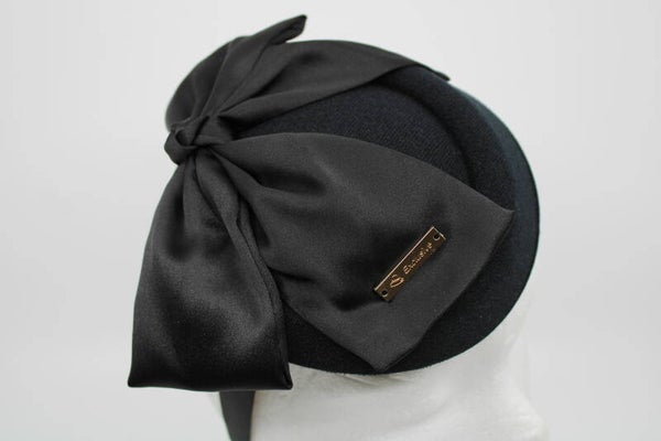 Haarbanddopje strik - zwart