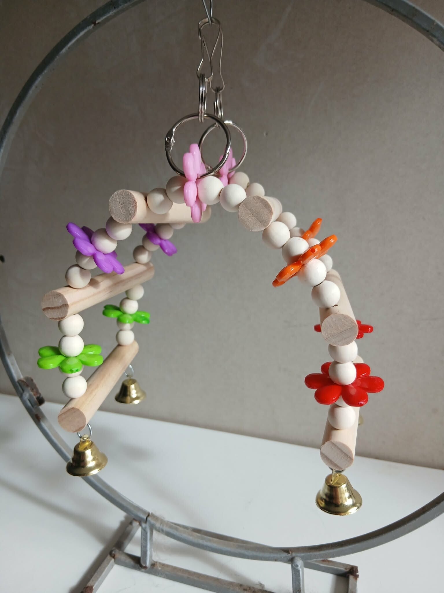 jouet arche suspendu fleuri