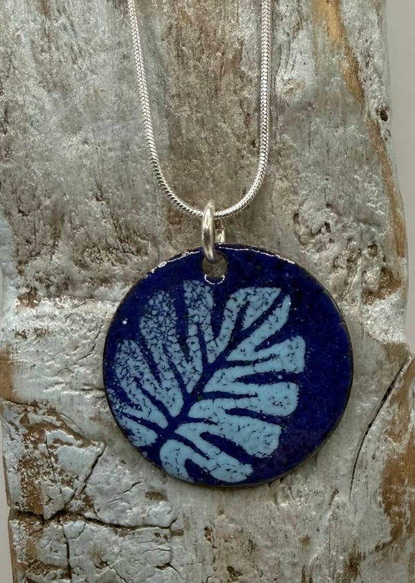 Glass enamel jewellery on copper.