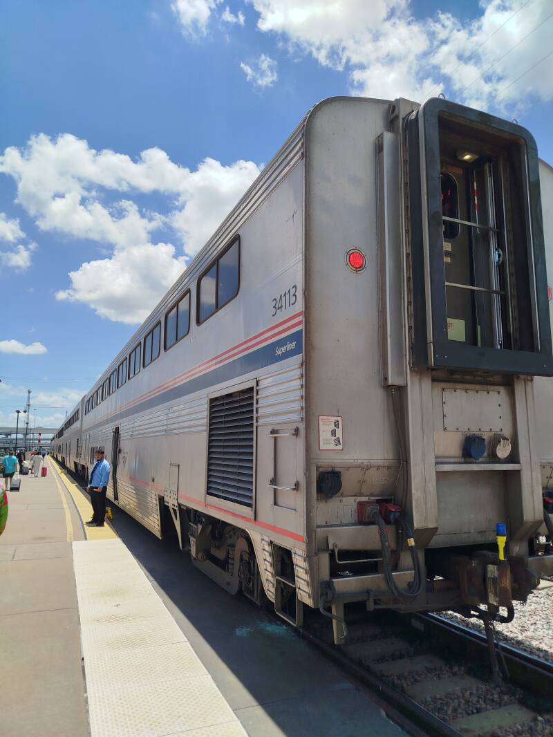 Amtrak train at a railway station waiting for its passengers