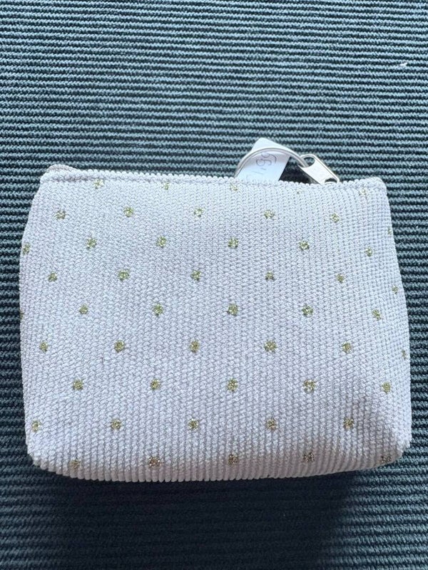 Beige met goude stippen