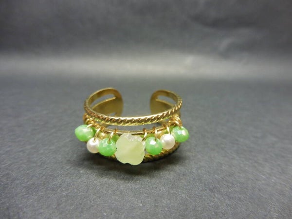 Ring groen met crème en wit tint