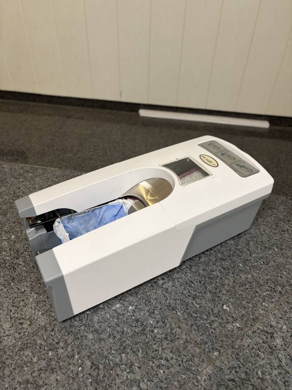 Overschoen dispenser Revolution 100