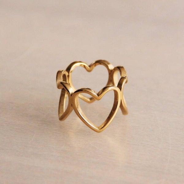 RVS statement ring met 4 open harten