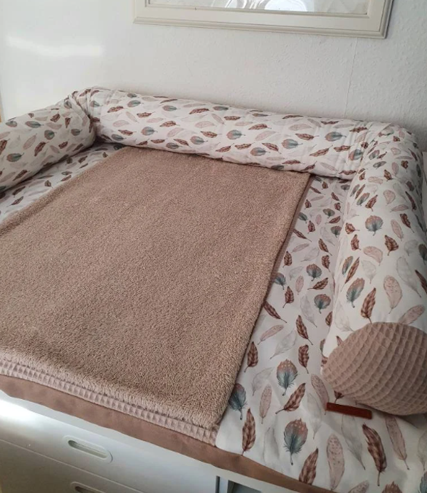 Wickelauflage zarte federn hellbeige
