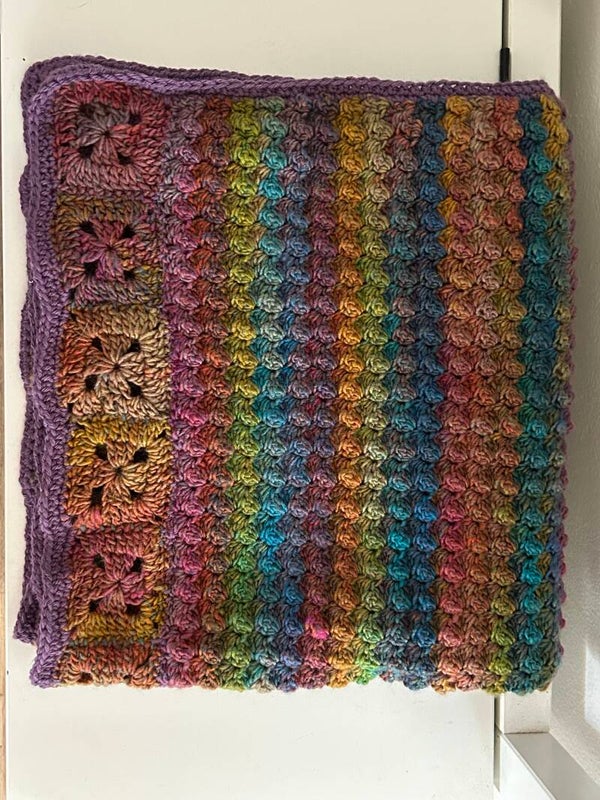 Handmade knitted and crocheted dog blanket