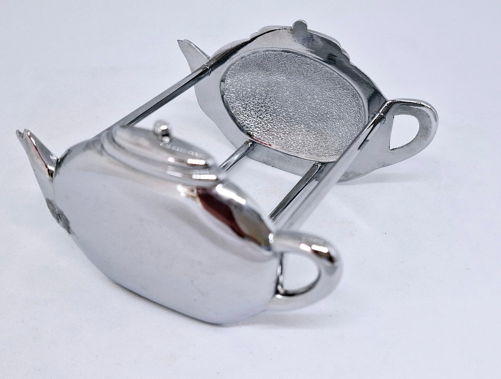 Vintage theezakjeshouder theepot