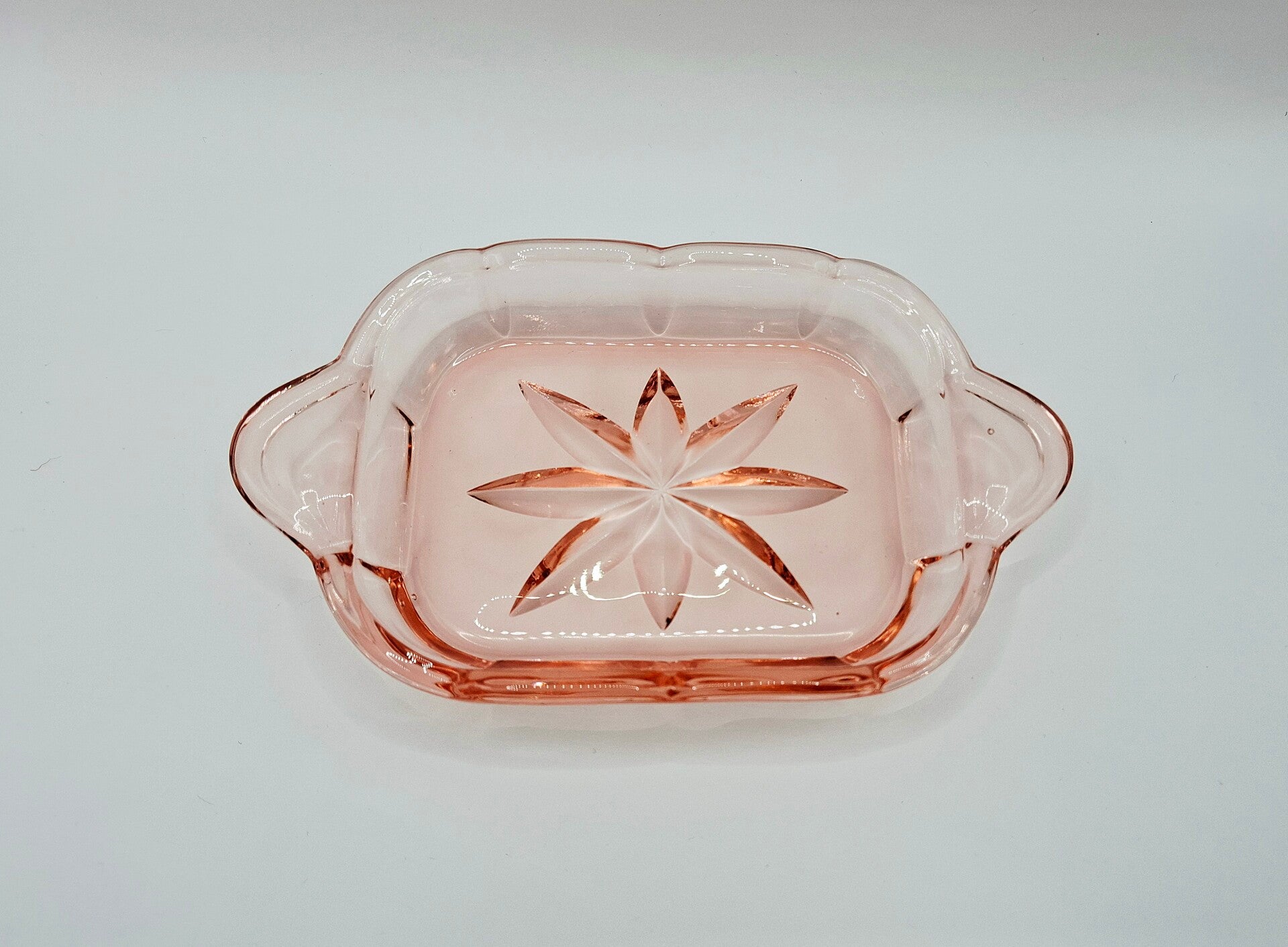 Roze persglas schaaltje met sterdecoratie