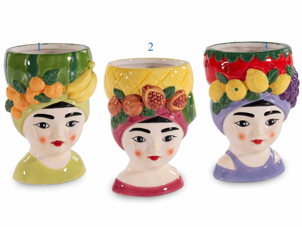 Vaso in ceramica colorata lucida con volto donna con frutta
