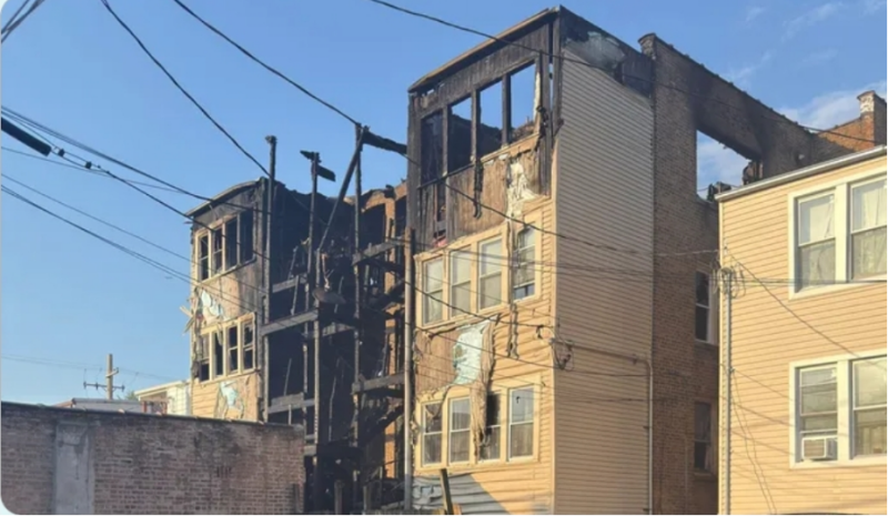 Post-fire image showing the extensive damage to the building, symbolizing the deep mutation and restructuring of the home.