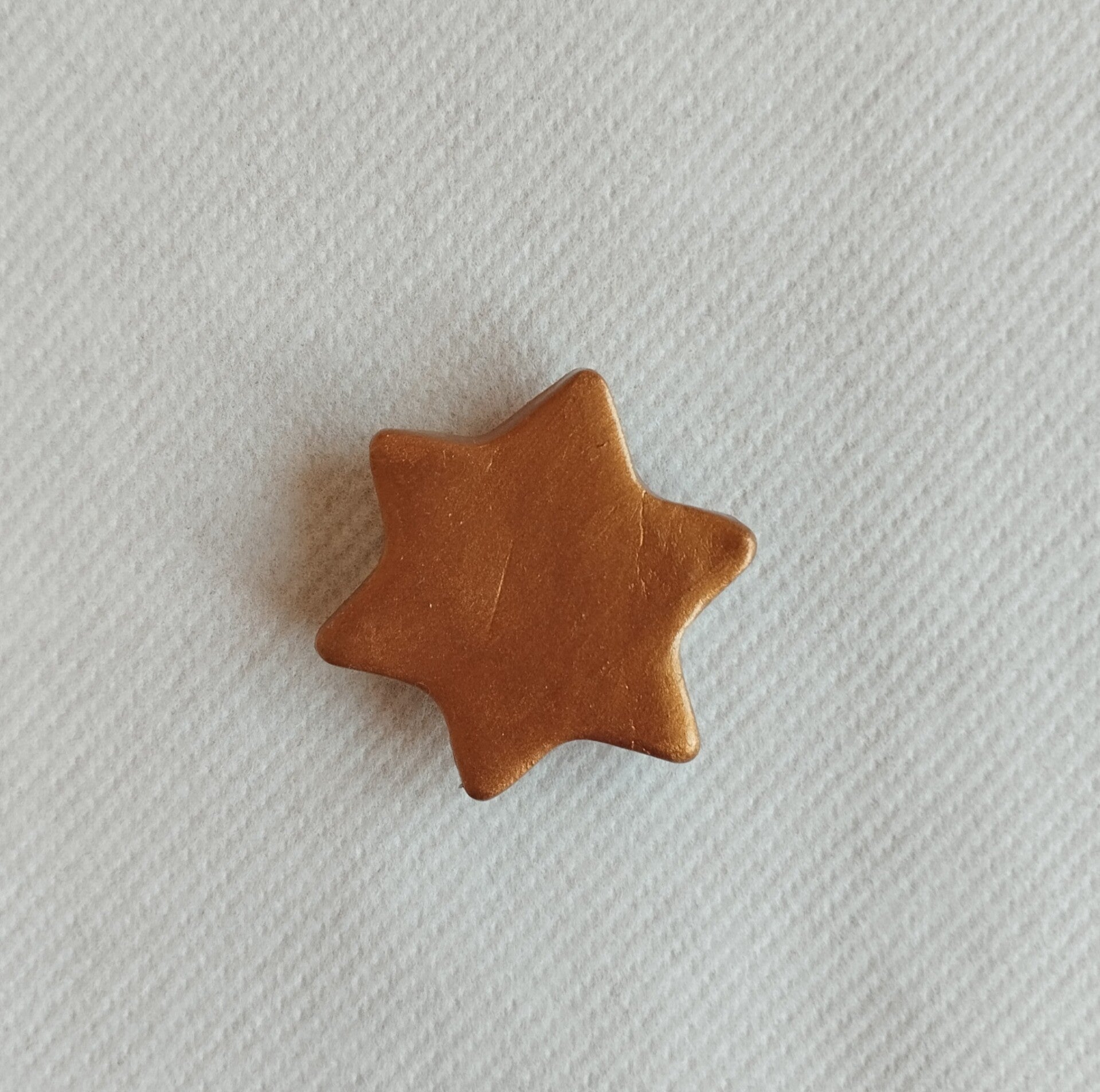 Magnet étoile doré irisé