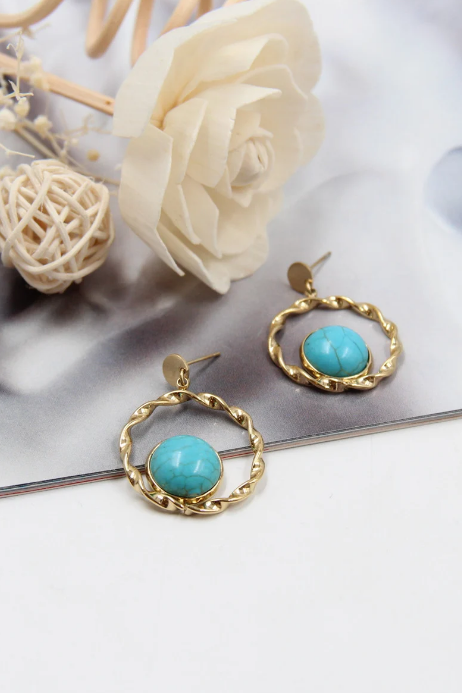 Boucle d'oreille en acier perle bleue
