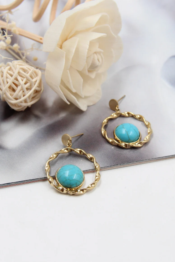 Boucle d'oreille en acier perle bleue