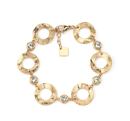 Bracelet en acier inoxydable, anneaux martelés, sertis de pierres scintillantes.