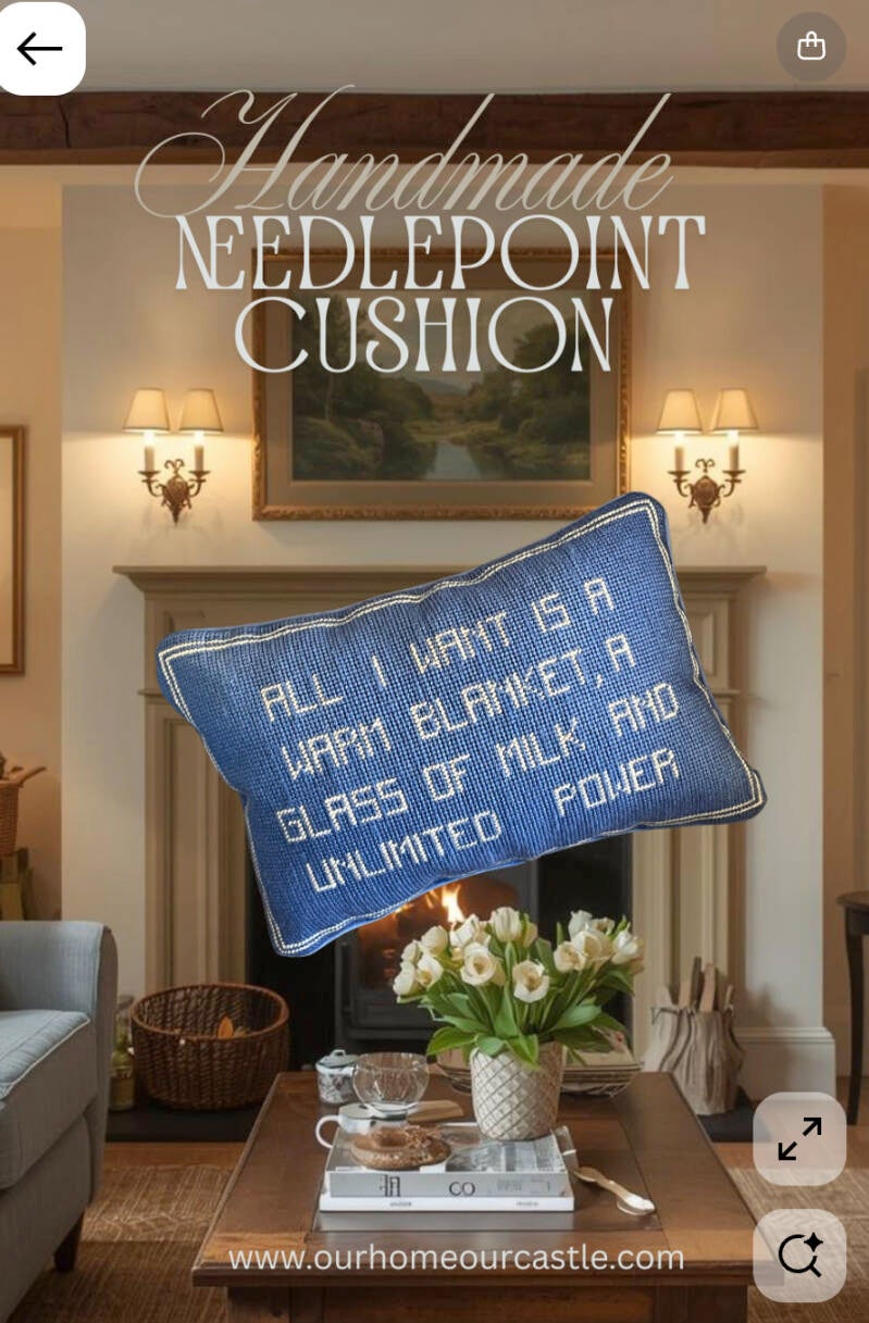 English country cottage interior with vintage-inspired handmade needlepoint cushions and soft floral decor