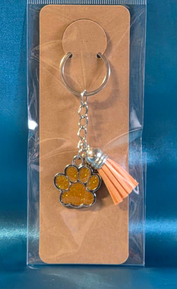Glitzer Hundepfote in Orange mit Leder Anhänger