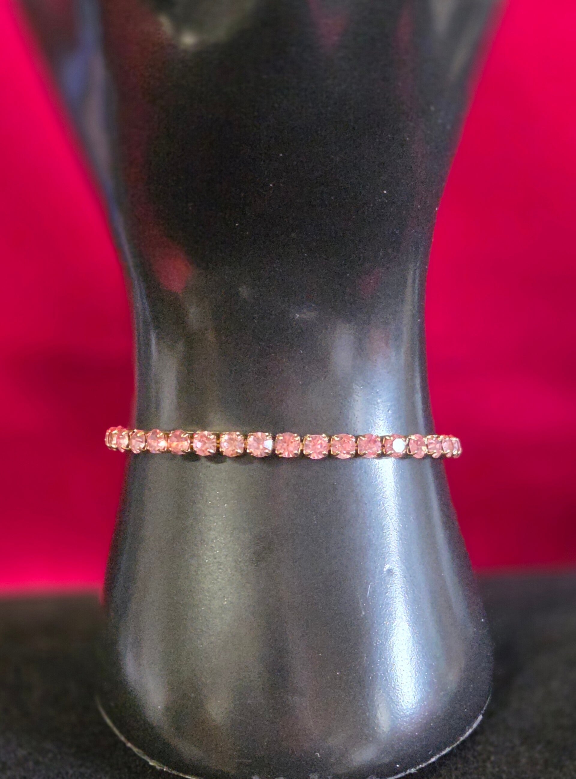 Armband mit rosanen Steinen - gold - Titan Stahl