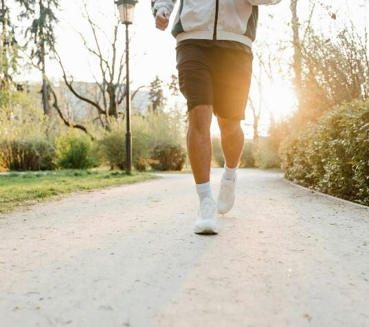 Coureur réalisant son plan d'entrainement établi par un coach personnel
