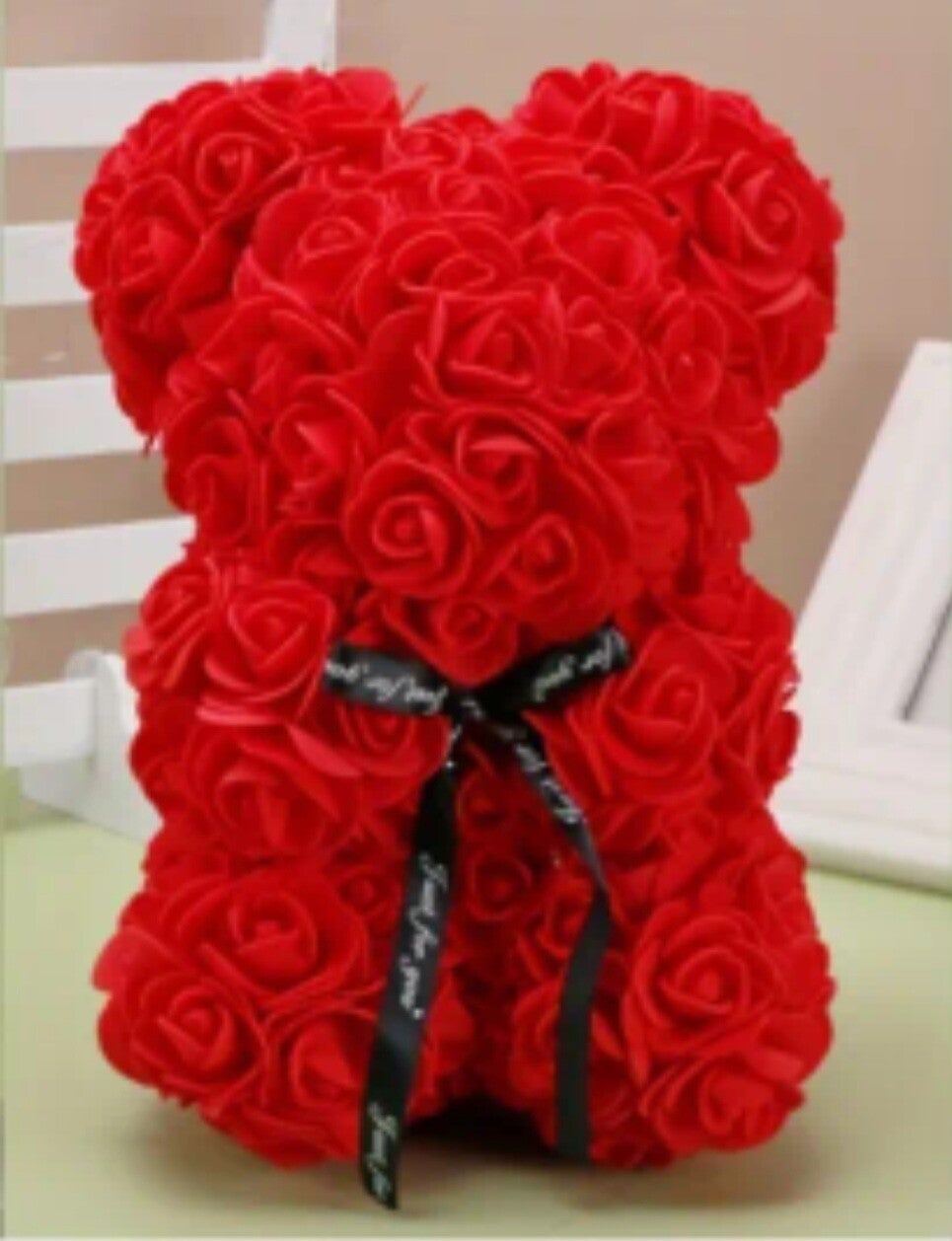 Tedybär aus Rosen in Geschenksverpackung mit LED Beleuchtung