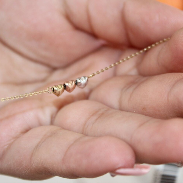 PULSERA CORAZONES 3 OROS 0093