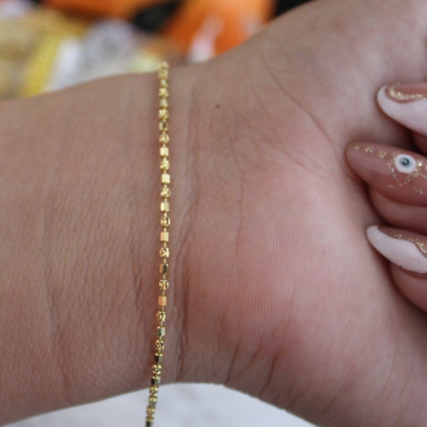 PULSERA BOLITA BISELADA