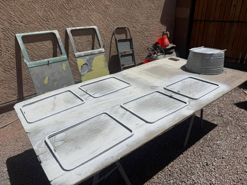Wayne painted window frames.