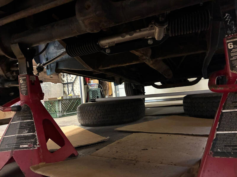 John was working on the rack and pinion under the Raffle Bus 35, and then Brad was able to help.
