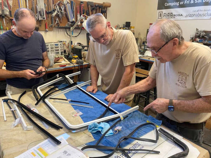 John talking with Brian and David about the window assembly.
