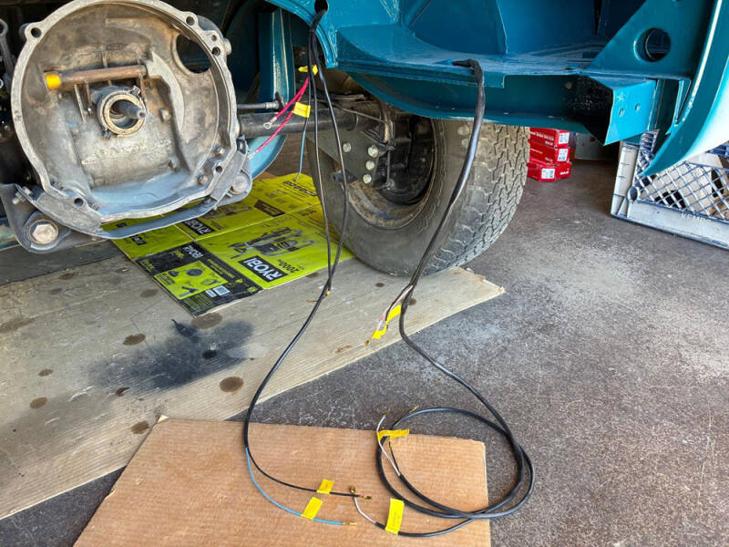 John is working on the wiring for the Raffle Bus 35.